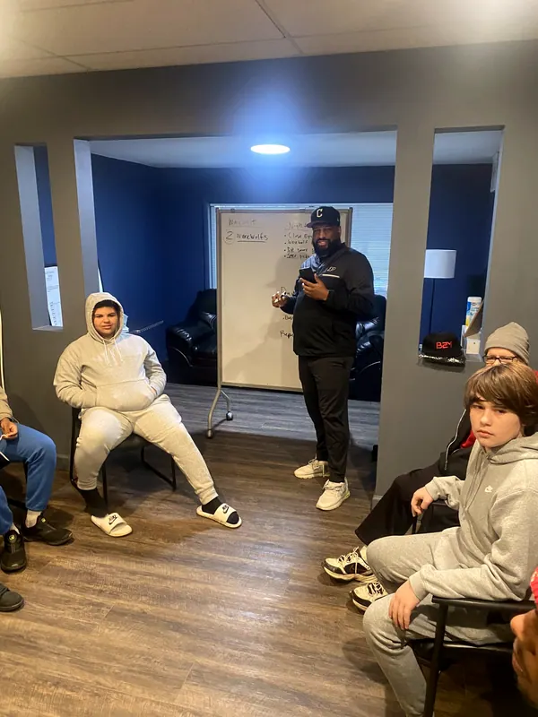 Boys listening during a group session.