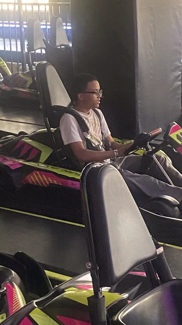 A boy in a go-kart.